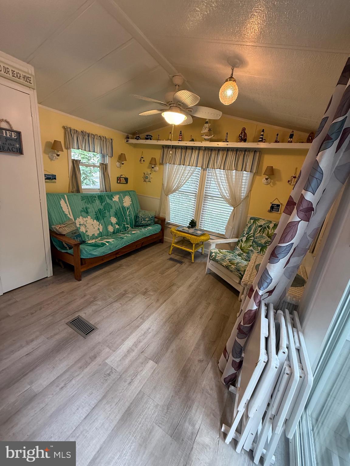515 Corsons Tavern Road, Unit F49 Ocean View, NJ 08230 - Photo 4 of 12 a view of an entryway with wooden floor