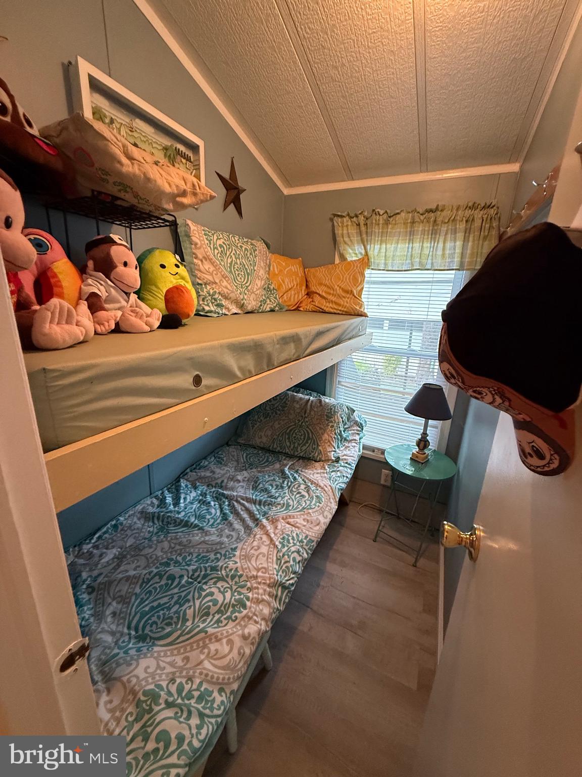 515 Corsons Tavern Road, Unit F49 Ocean View, NJ 08230 - Photo 7 of 12 a view of walk in closet with clothes and shoes