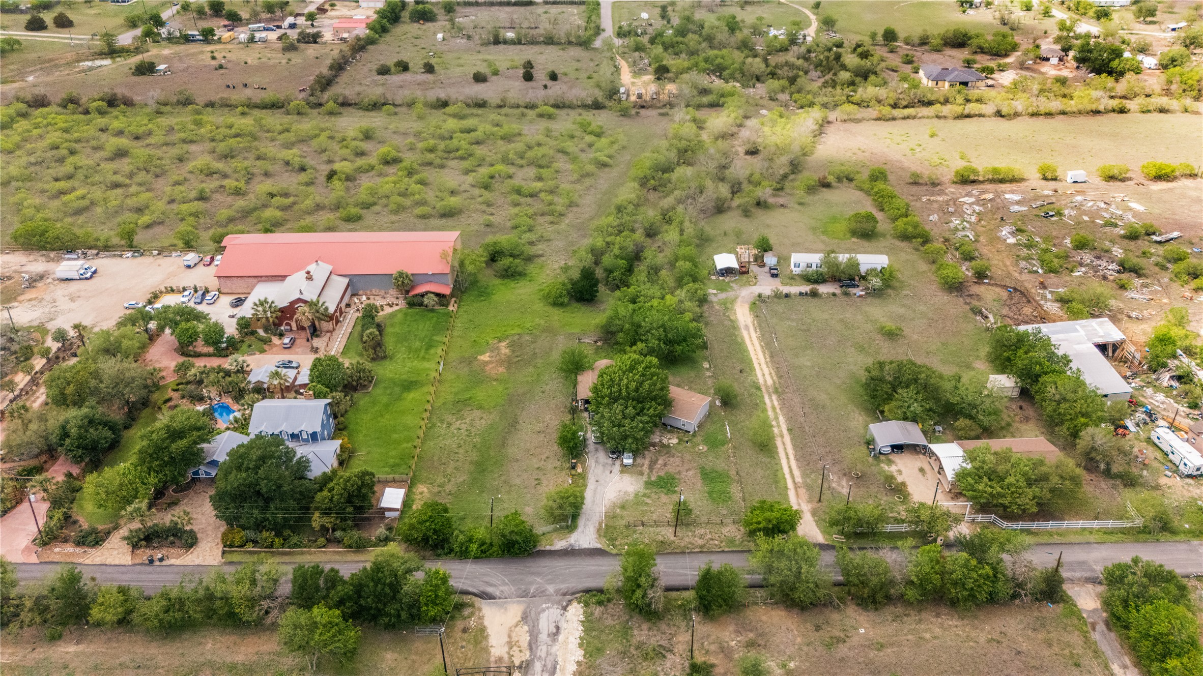 8802 Evelyn Road Buda, TX 78610 - Photo 6 of 13 Access to Scriber road in the green space between these two lots.