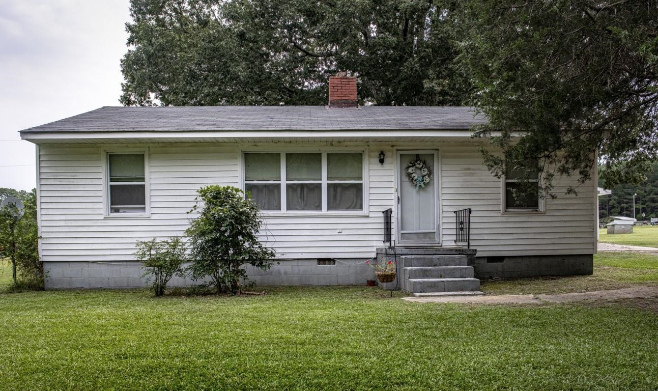 3795 Seven Paths Road Louisburg, NC 27549 - Photo 1 of 21 a view of a house with a yard
