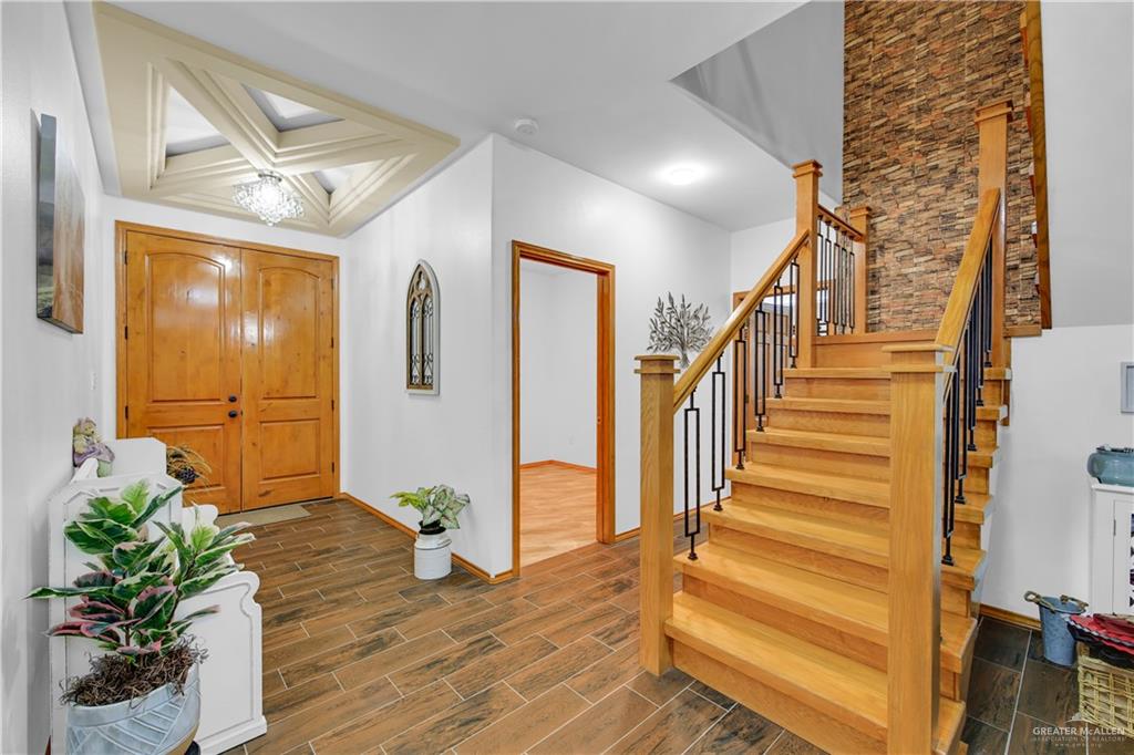 26072 Brushline Road Edcouch, TX 78538 - Photo 2 of 32 a view of entryway and hall with wooden floor