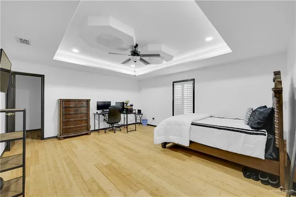 a bed room with a bed and furniture