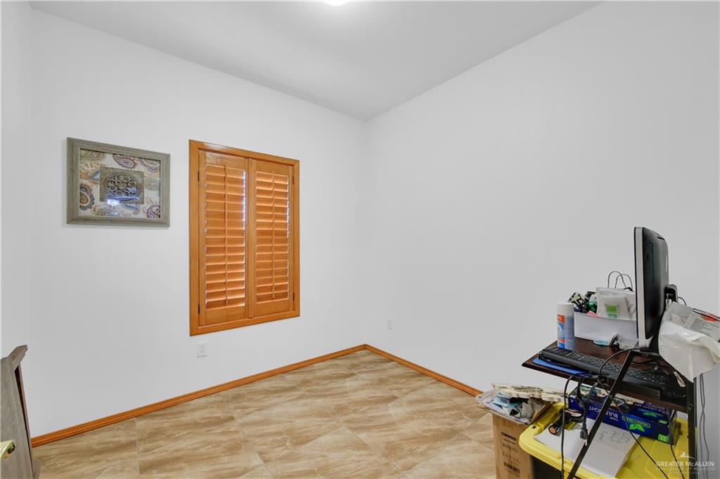 26072 Brushline Road Edcouch, TX 78538 - Photo 5 of 32 a view of workspace with wooden floor