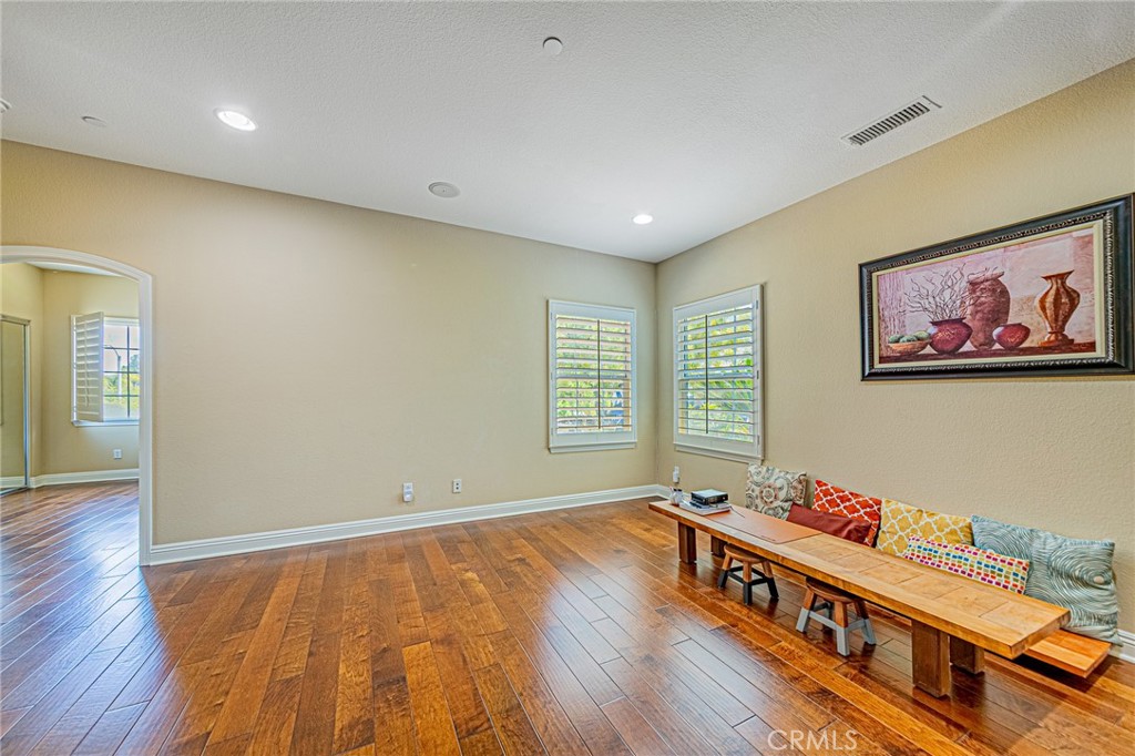 4088 Shady Ridge Circle Corona, CA 92881 - Photo 27 of 47 wooden floor in a room with a window