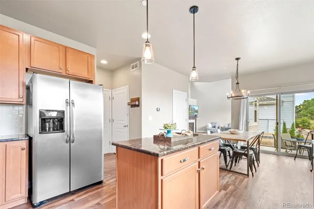 a bedroom with a large bed and a large window