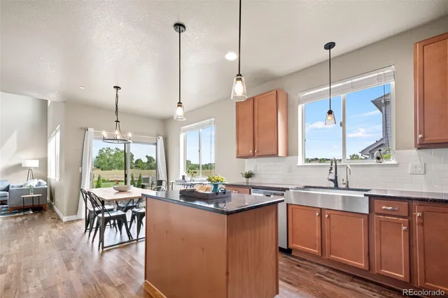 a bedroom with a bed and a flat tv screen