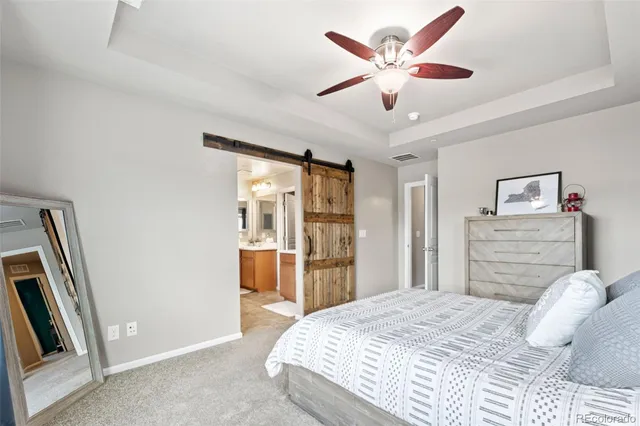 a workspace with furniture and a window