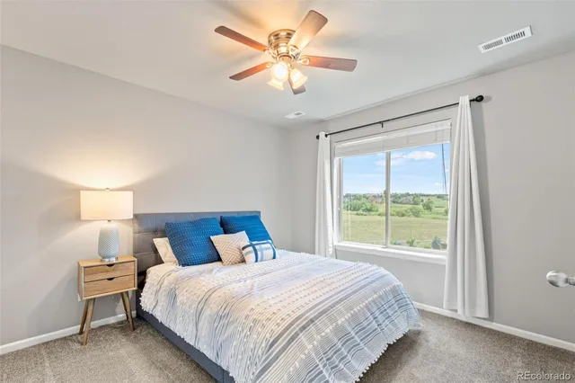 a view of room with furniture and a window