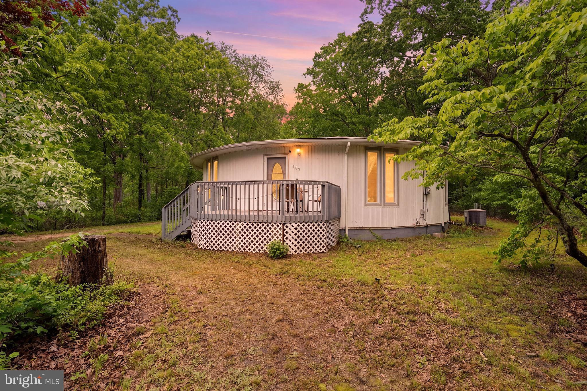 188 Carlisle Place Road Leesburg, NJ 08327 - Photo 2 of 36 a view of a house with backyard and tree