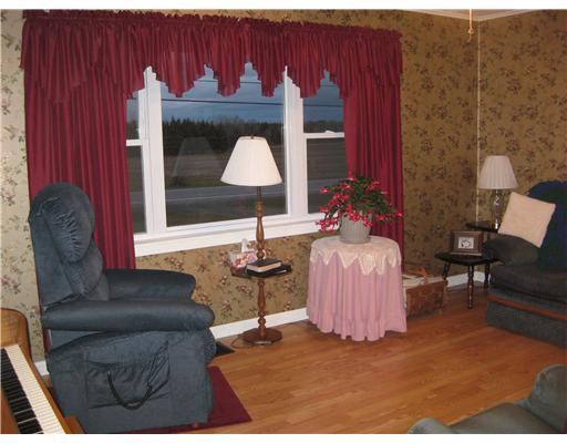 392 Haystack Road Castle Hill, ME 04757 - Photo 7 of 17 Living Room.