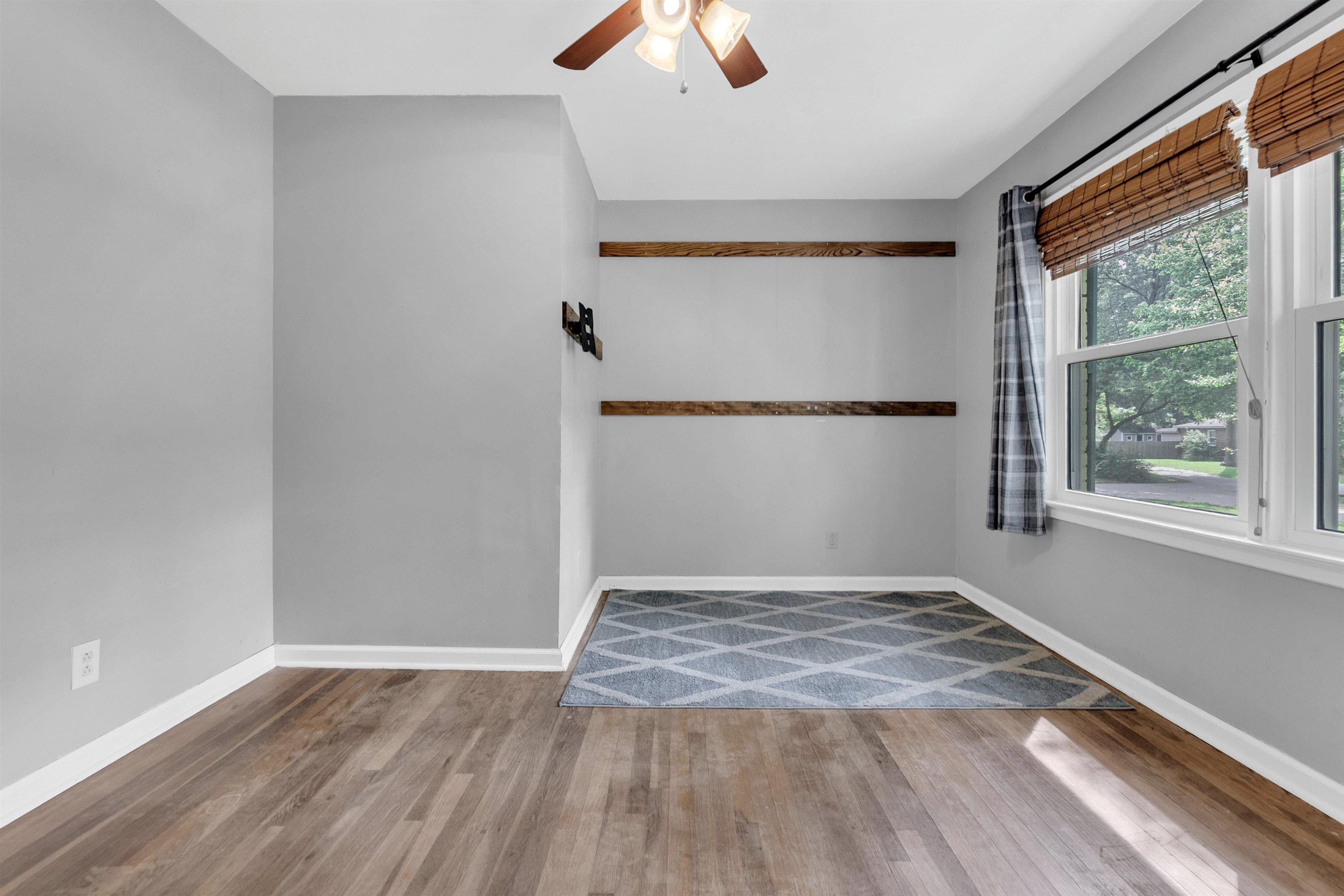 3024 Keats Road Bartlett, TN 38134 - Photo 18 of 32 Spare room featuring wood finished floors and ceiling fan