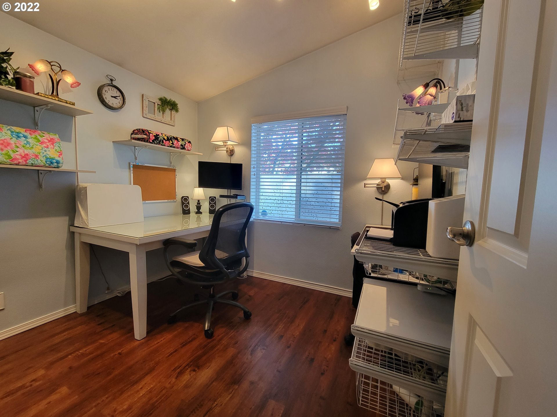 9811 Southwest Herman Road, Unit 43 Tualatin, OR 97062 - Photo 20 of 32 a view of a workspace with furniture and a window