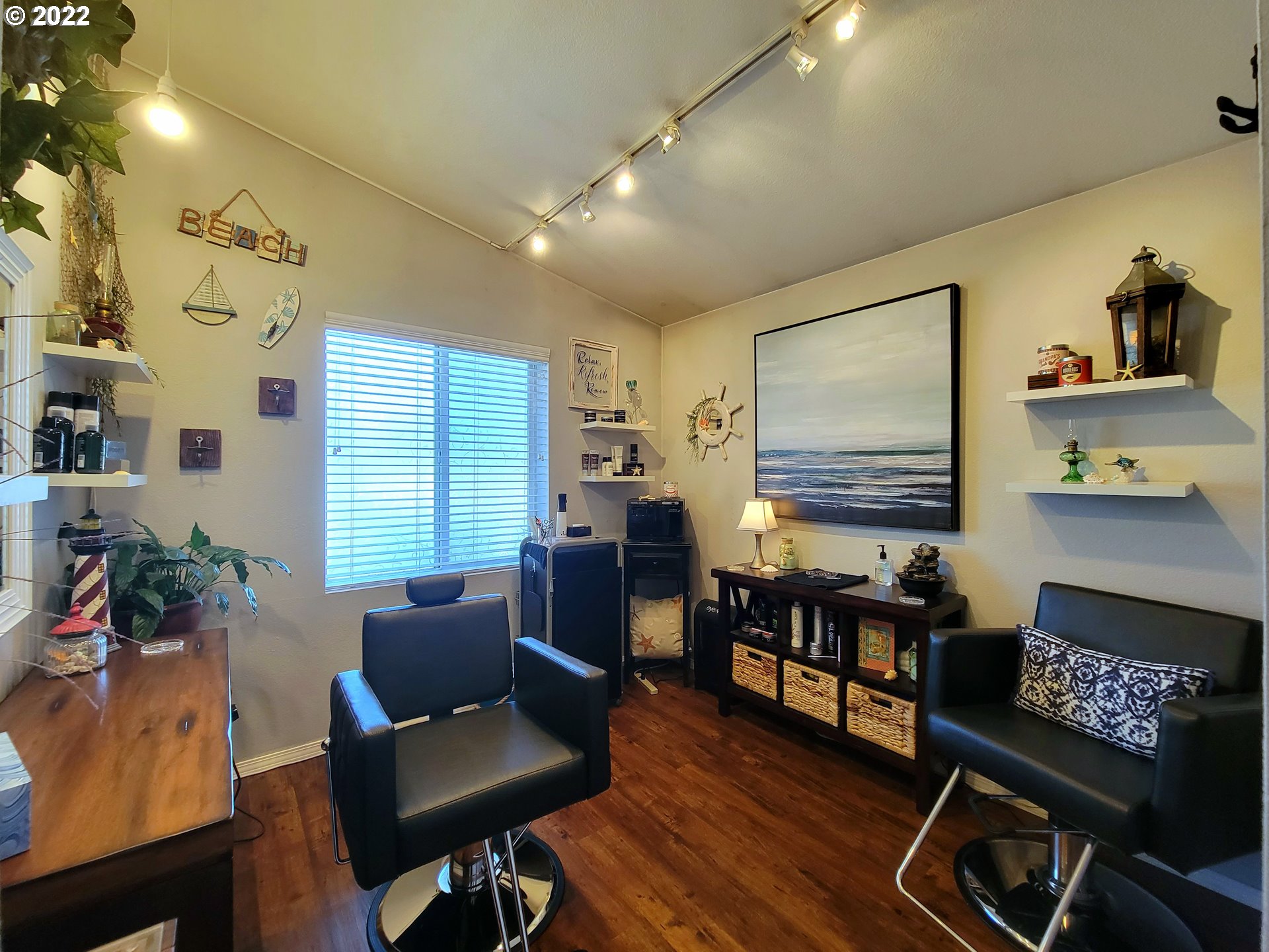 9811 Southwest Herman Road, Unit 43 Tualatin, OR 97062 - Photo 22 of 32 a living room with furniture and a wooden floor