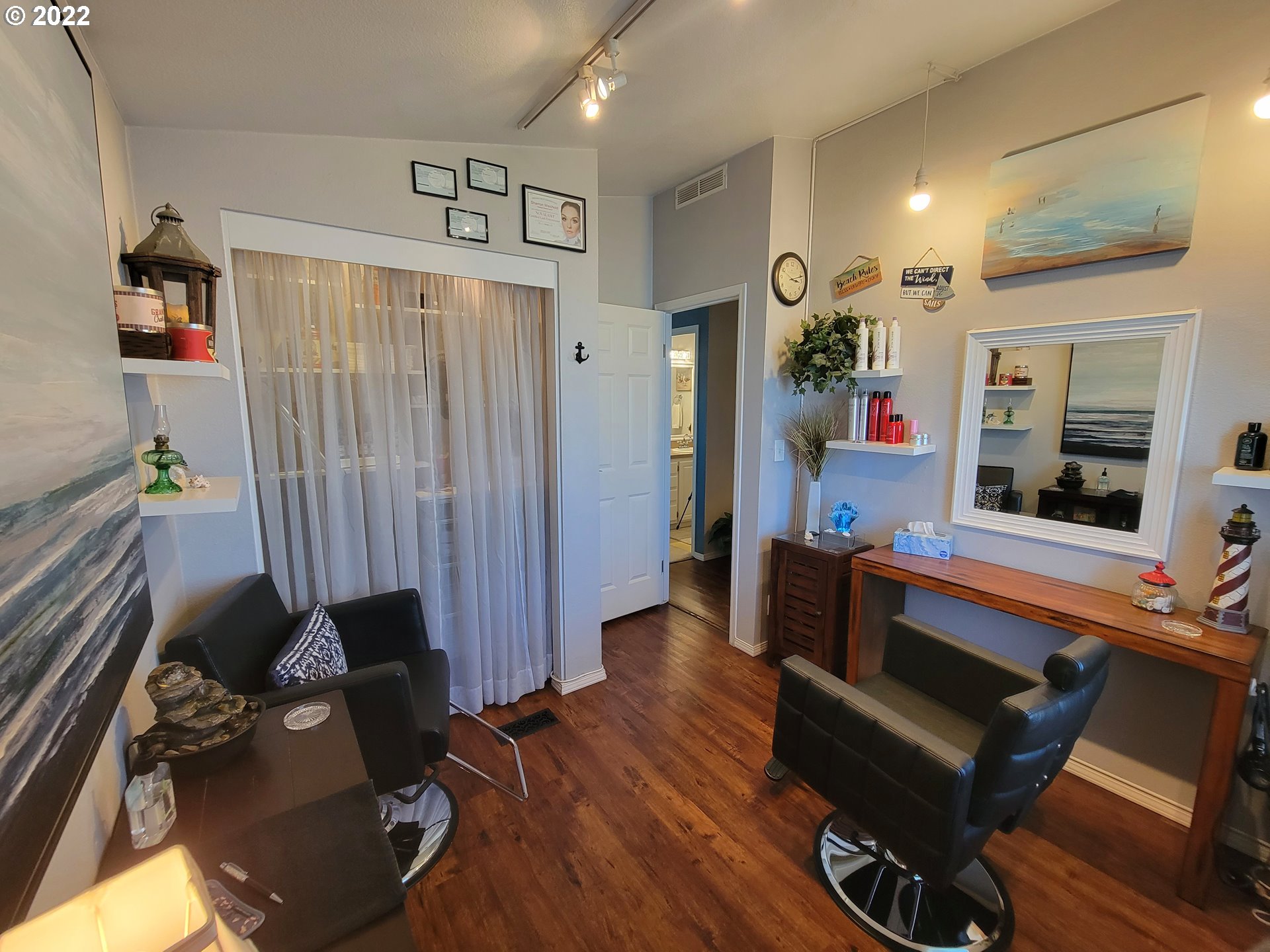 9811 Southwest Herman Road, Unit 43 Tualatin, OR 97062 - Photo 23 of 32 a living room with furniture and wooden floor