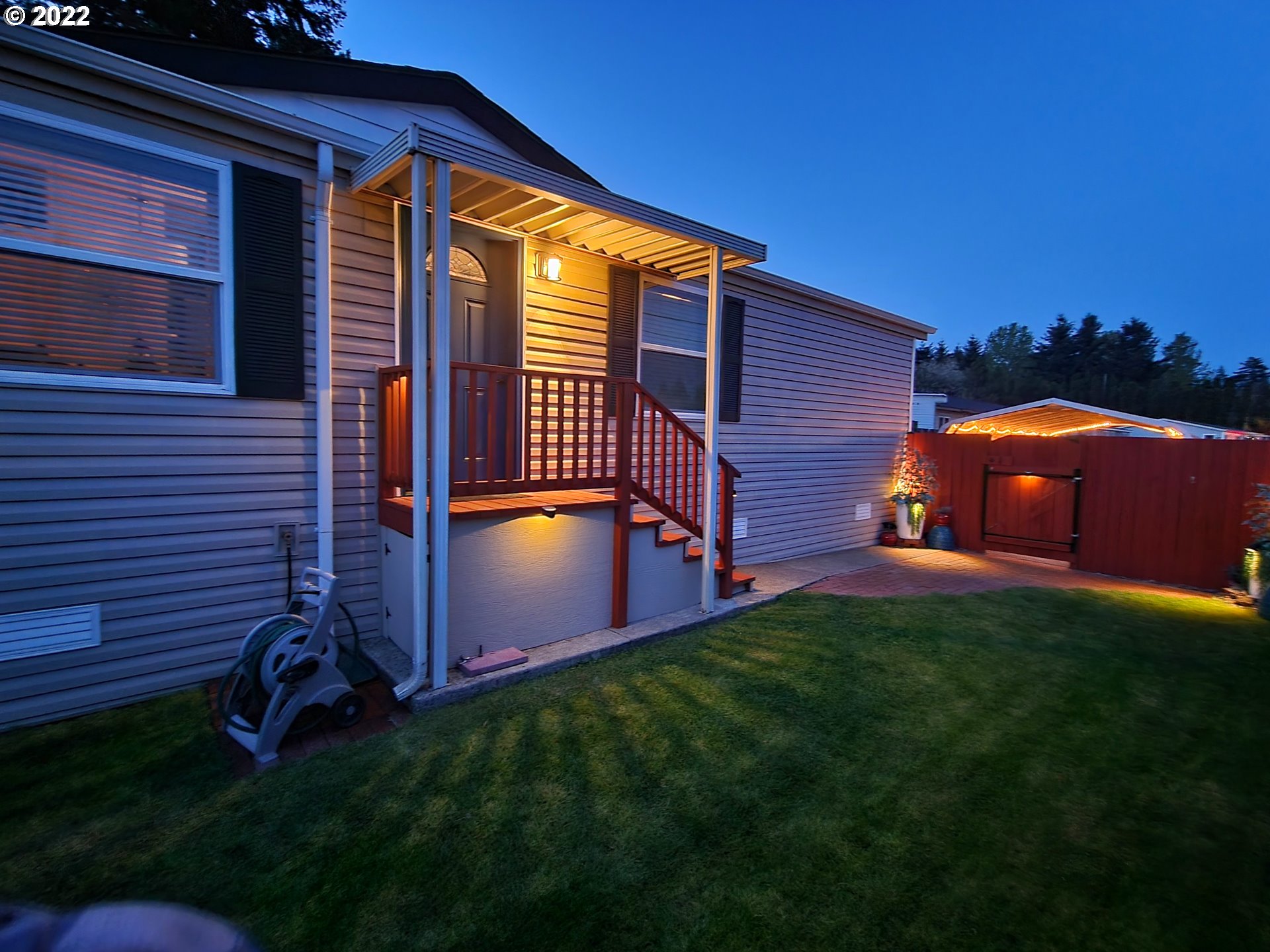 9811 Southwest Herman Road, Unit 43 Tualatin, OR 97062 - Photo 29 of 32 a backyard of a house with lots of green space