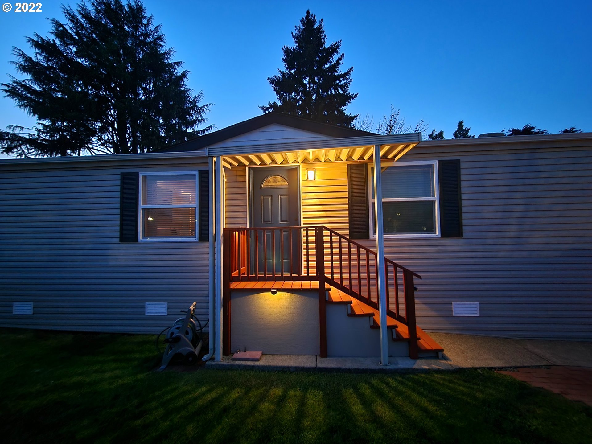 9811 Southwest Herman Road, Unit 43 Tualatin, OR 97062 - Photo 30 of 32 a view of a house with backyard and garden