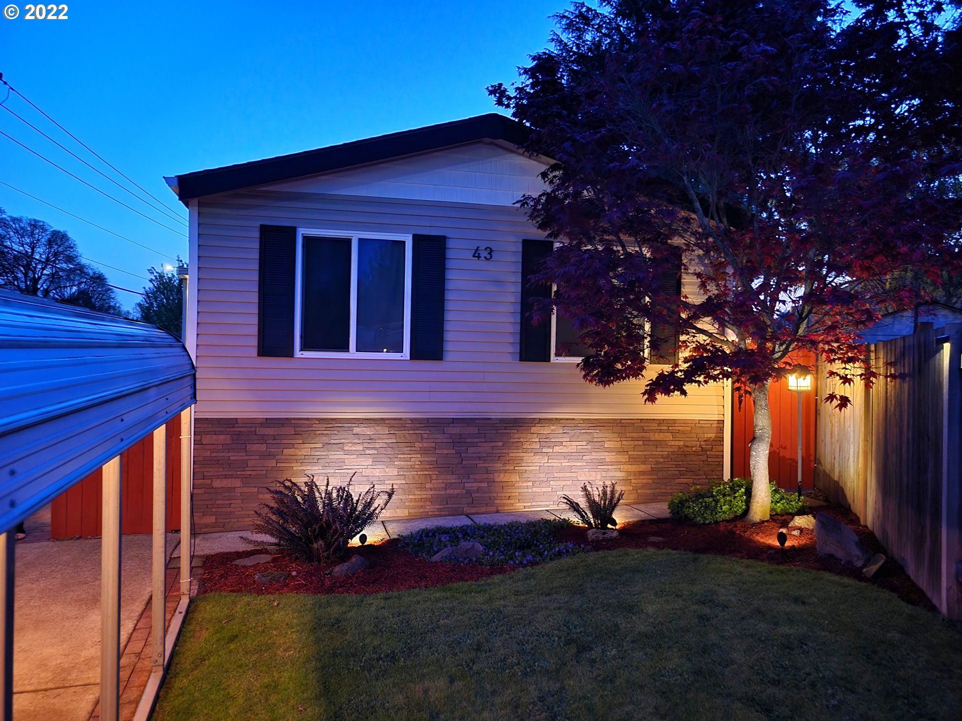9811 Southwest Herman Road, Unit 43 Tualatin, OR 97062 - Photo 32 of 32 a front view of a house with a yard