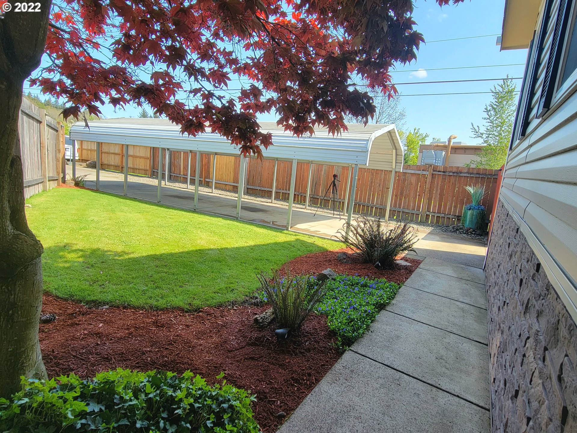 9811 Southwest Herman Road, Unit 43 Tualatin, OR 97062 - Photo 4 of 32 a view of a swimming pool with a patio