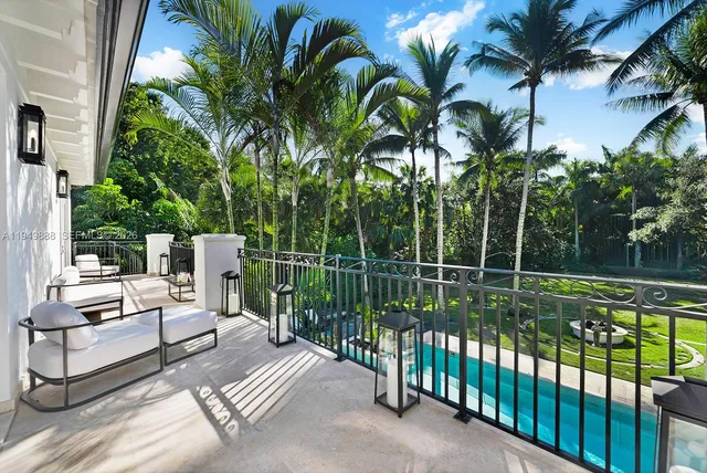 a view of a yard with swimming pool