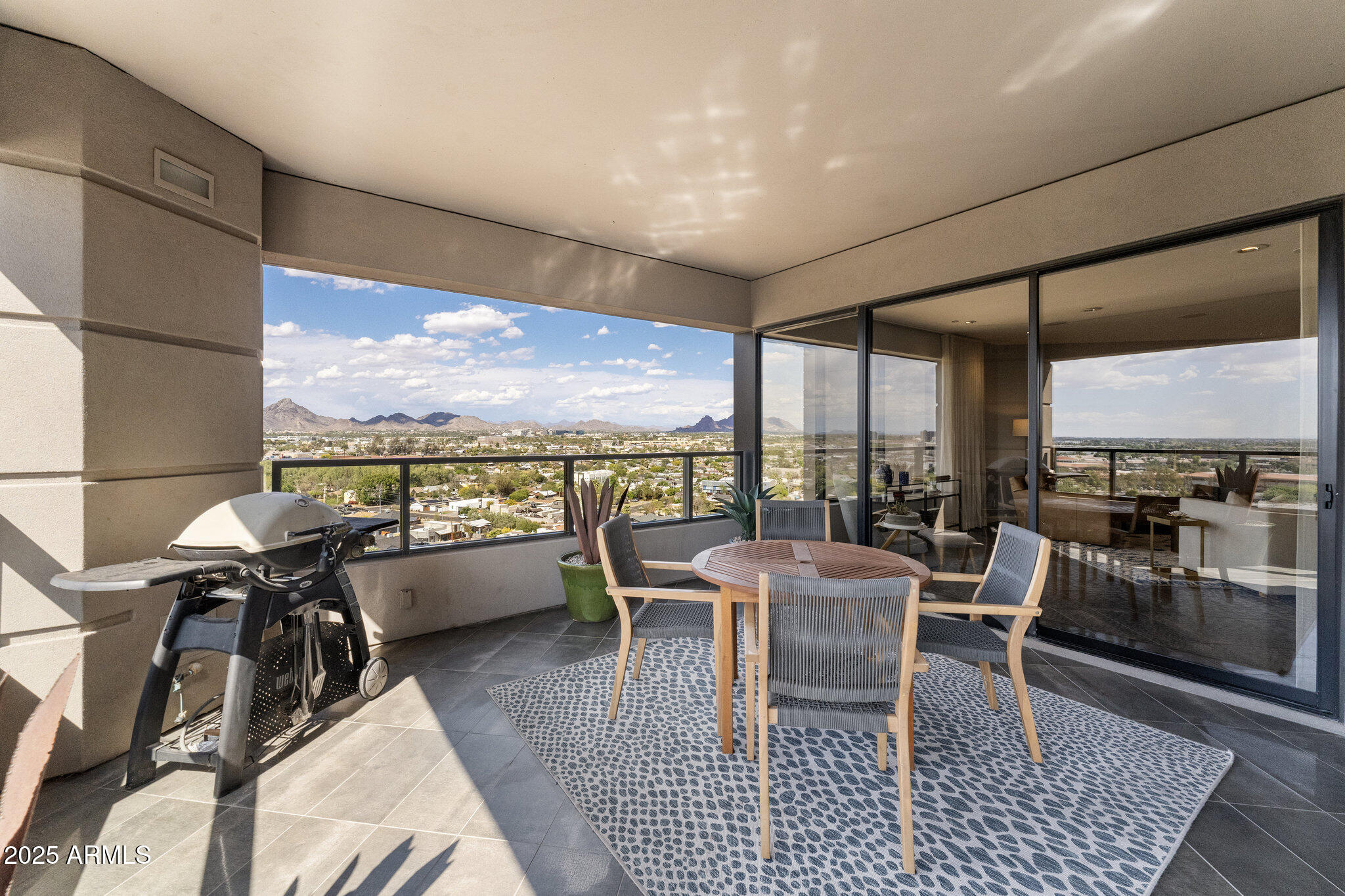 1040 East Osborn Road, Unit 1103 Phoenix, AZ 85014 - Photo 13 of 49 a dining room with furniture water view and pool table
