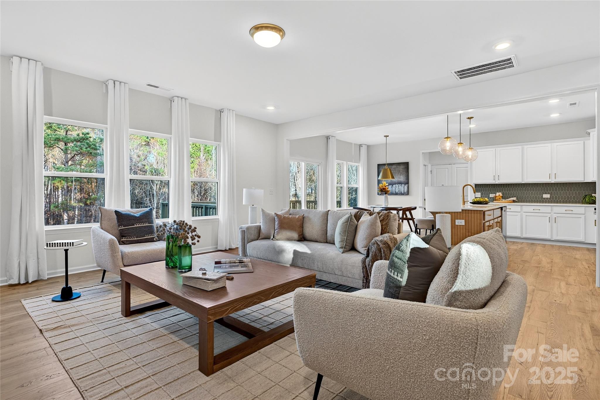 10315 Lakeshore Drive, Unit 89 Lancaster, SC 29720 - Photo 12 of 43 a living room with furniture wooden floor and a table