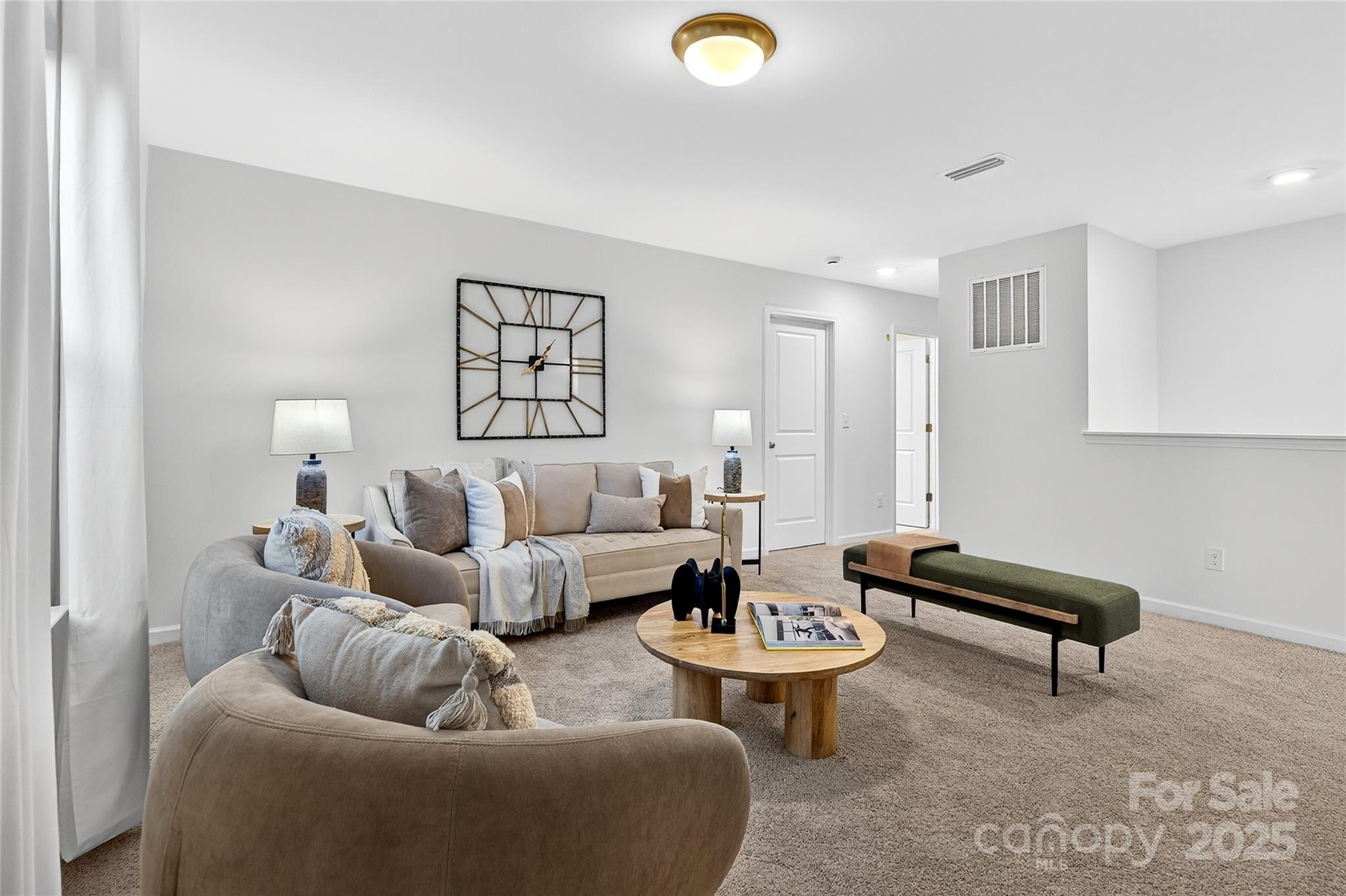 10315 Lakeshore Drive, Unit 89 Lancaster, SC 29720 - Photo 23 of 43 a living room with furniture and a rug