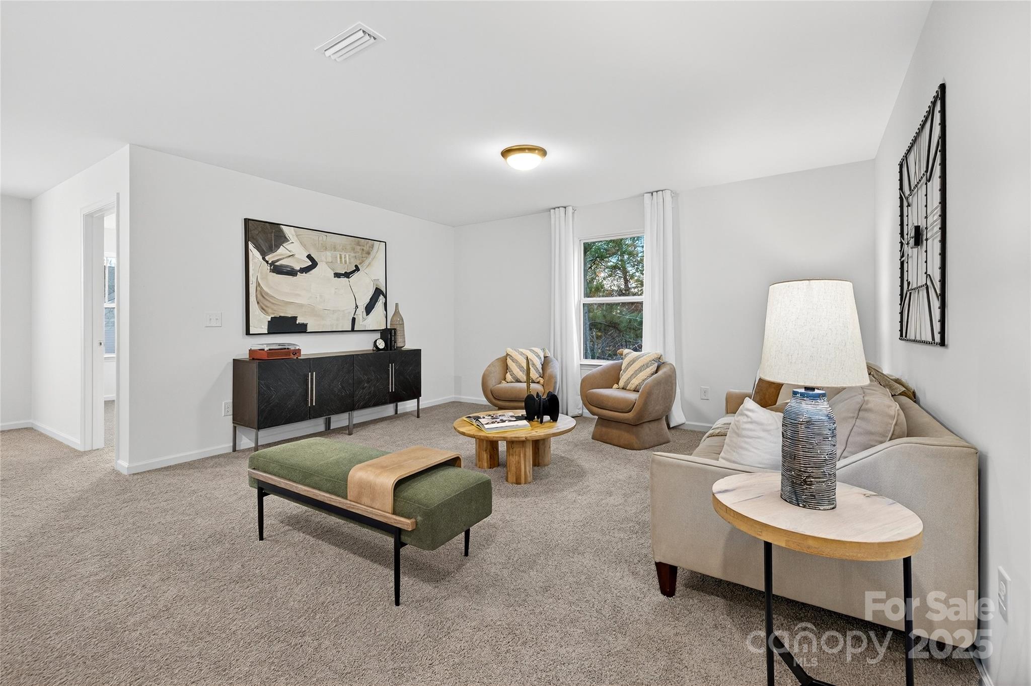 10315 Lakeshore Drive, Unit 89 Lancaster, SC 29720 - Photo 24 of 43 a living room with furniture and a lamp