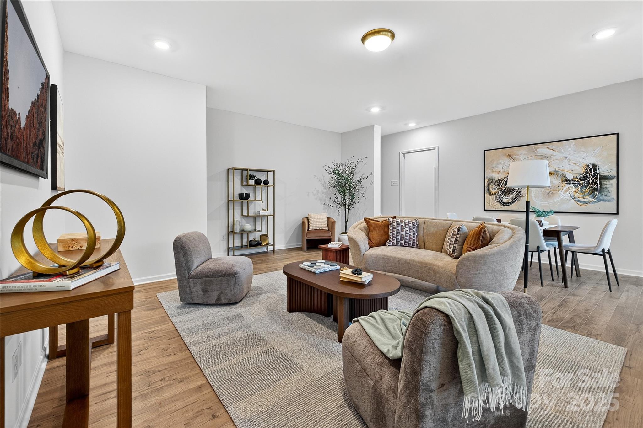 10315 Lakeshore Drive, Unit 89 Lancaster, SC 29720 - Photo 27 of 43 a living room with furniture a rug and a floor to ceiling window