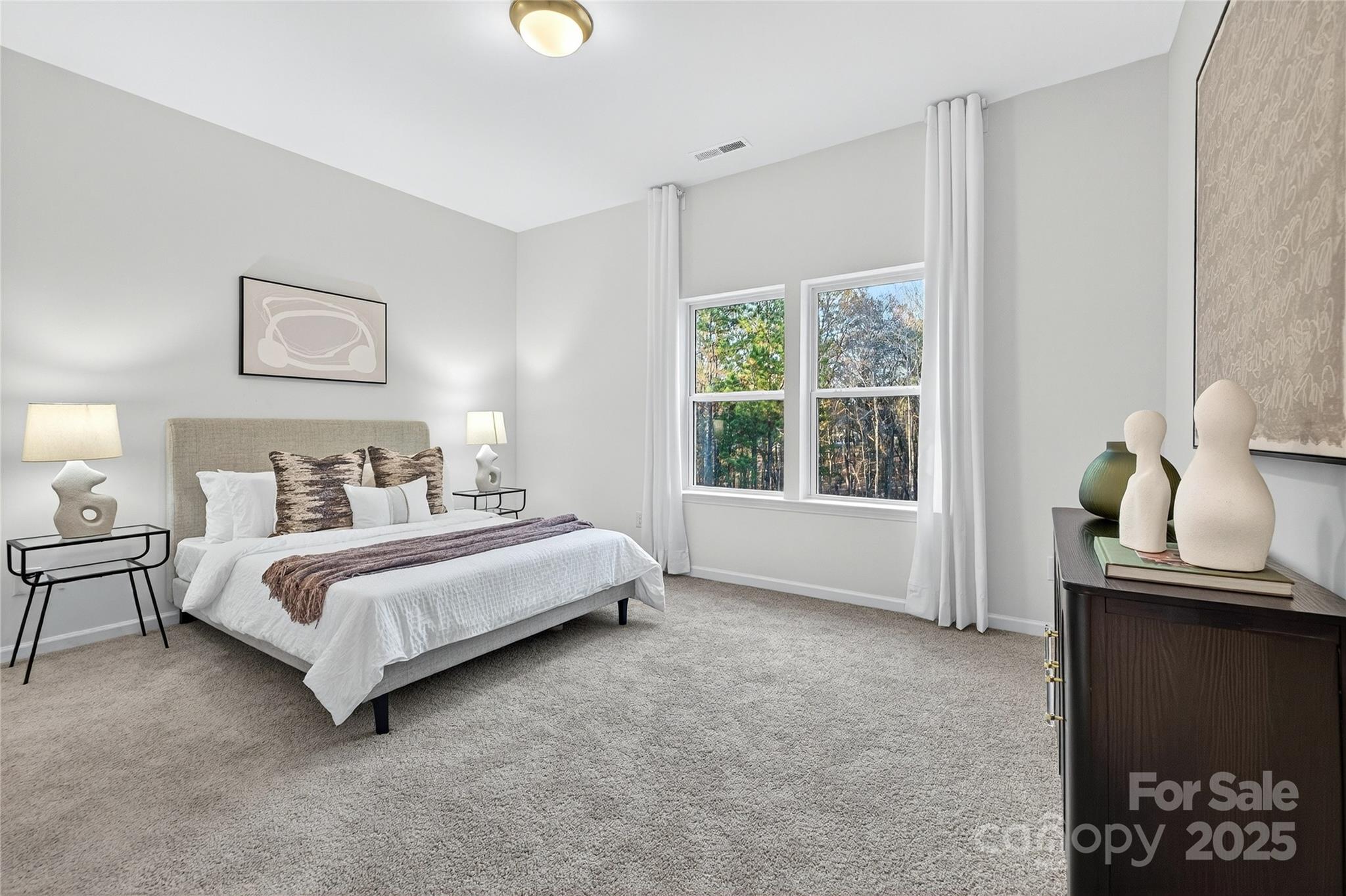 10315 Lakeshore Drive, Unit 89 Lancaster, SC 29720 - Photo 28 of 43 a spacious bedroom with a bed and a window