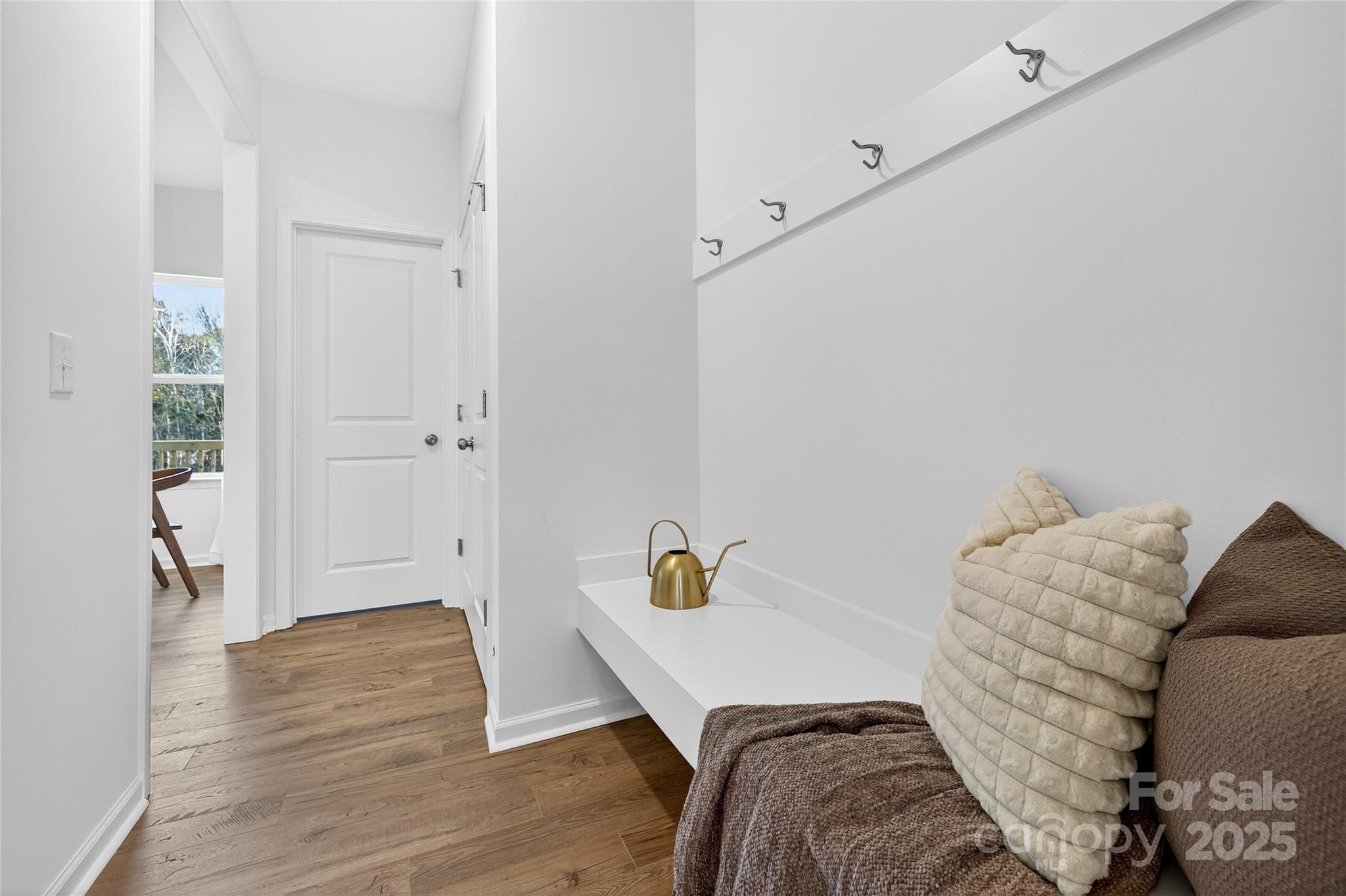 10315 Lakeshore Drive, Unit 89 Lancaster, SC 29720 - Photo 33 of 43 a bedroom with a bed and wooden floor