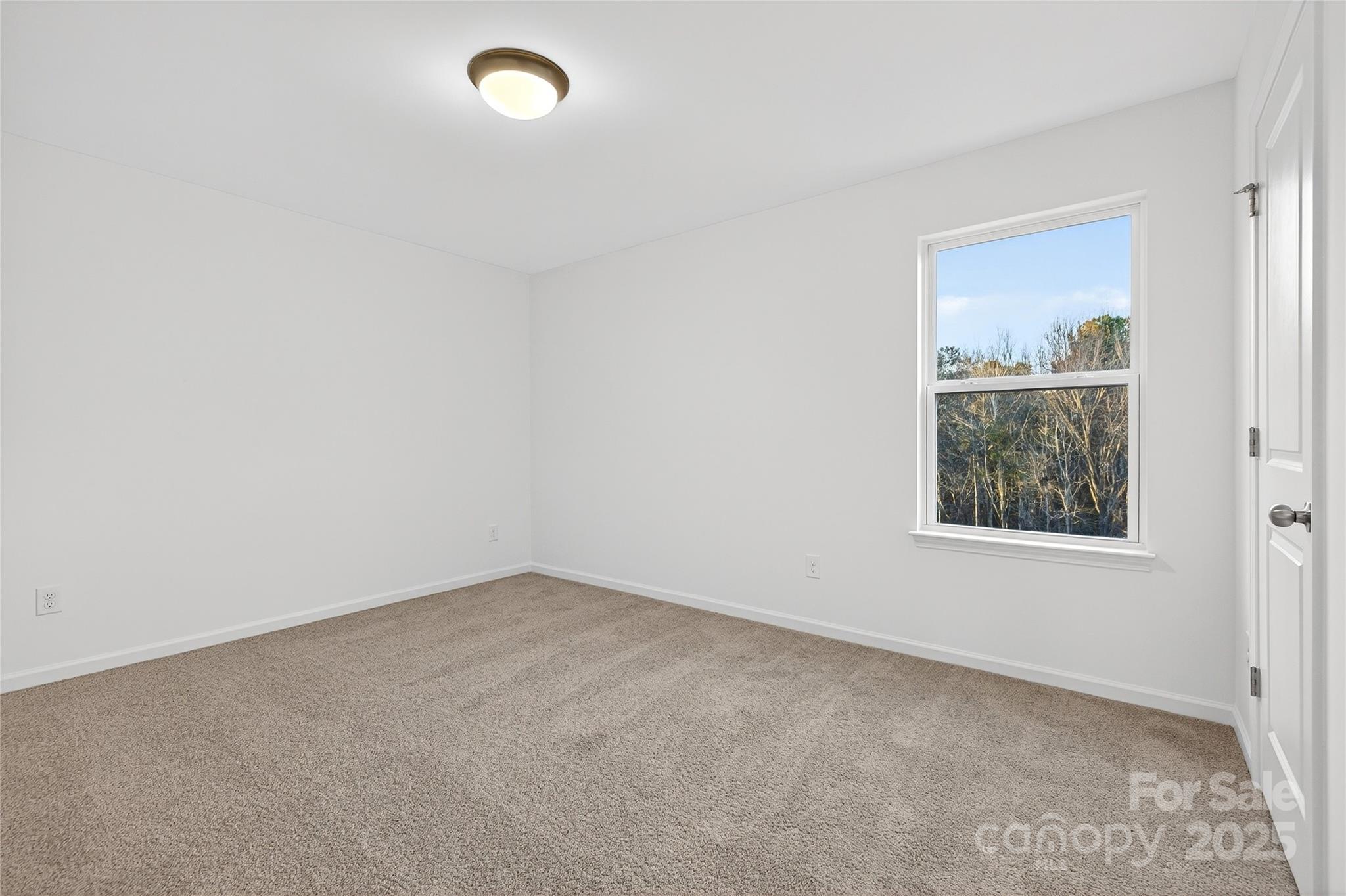 10315 Lakeshore Drive, Unit 89 Lancaster, SC 29720 - Photo 35 of 43 an empty room with a window