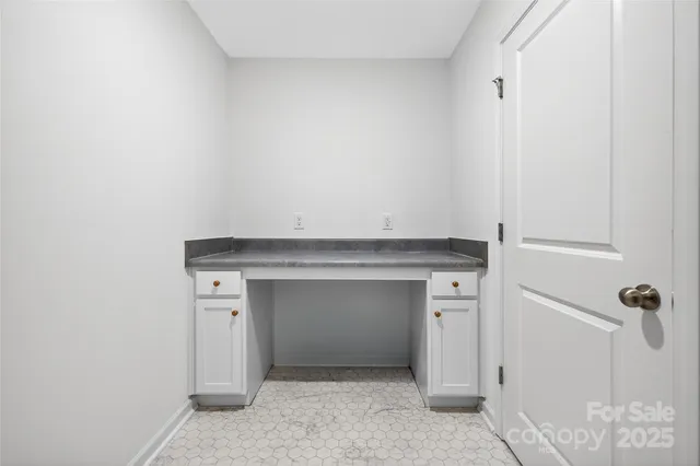 a view of storage and utility room