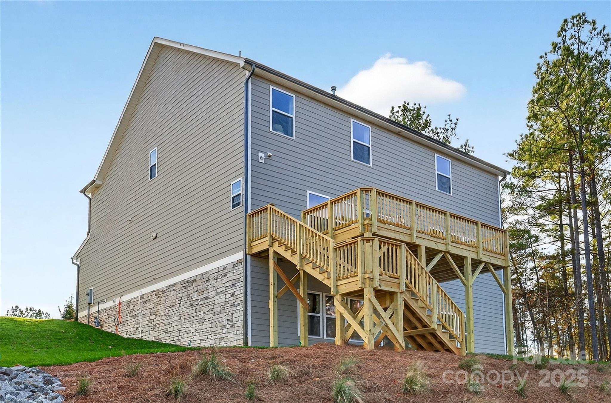 10315 Lakeshore Drive, Unit 89 Lancaster, SC 29720 - Photo 42 of 43 a front view of a house with a yard