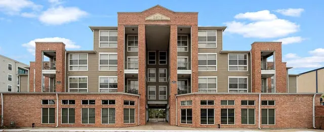 a front view of a building with glass windows