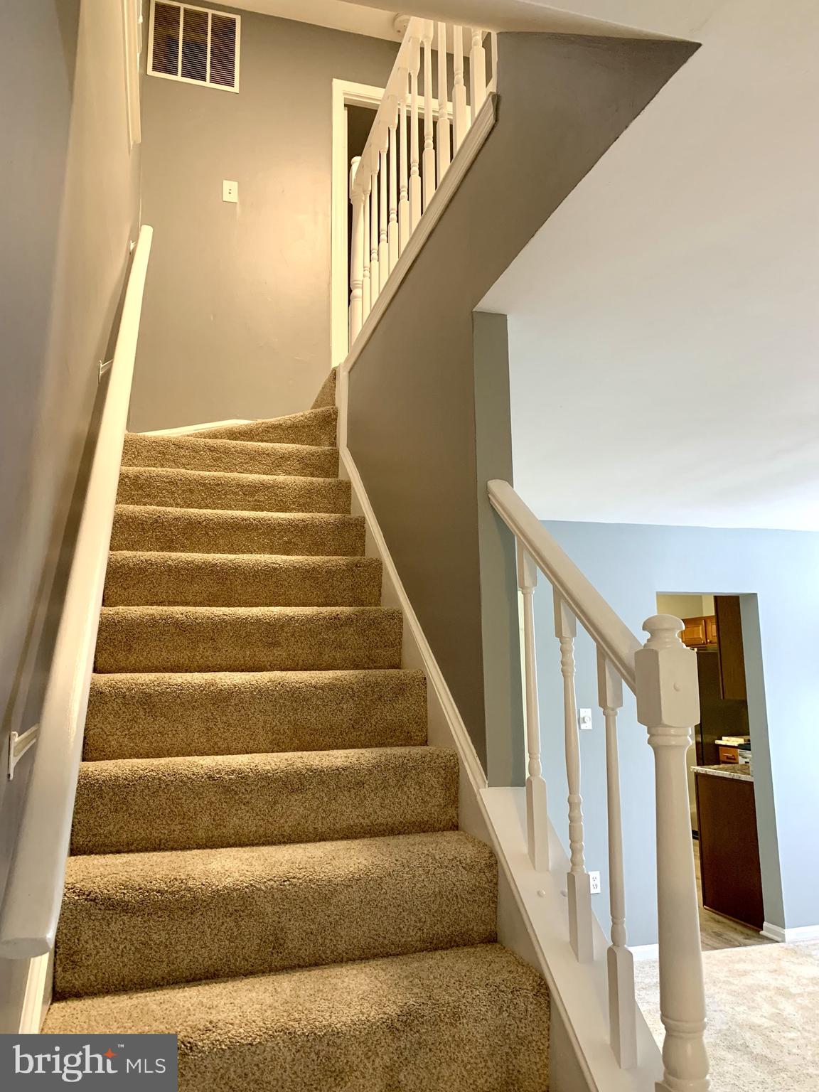 1667 Ridgely Court, Unit 178 Crofton, MD 21114 - Photo 13 of 33 Stairs to Upstairs - New Carpet