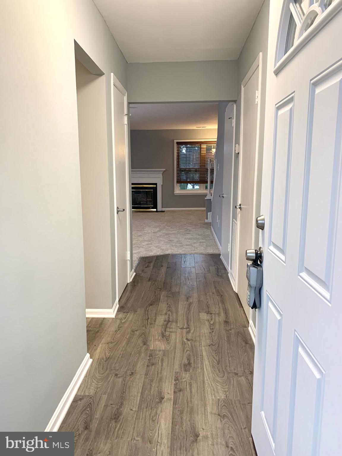 1667 Ridgely Court, Unit 178 Crofton, MD 21114 - Photo 3 of 33 Foyer/Entrance w/New Laminate Wood Flooring