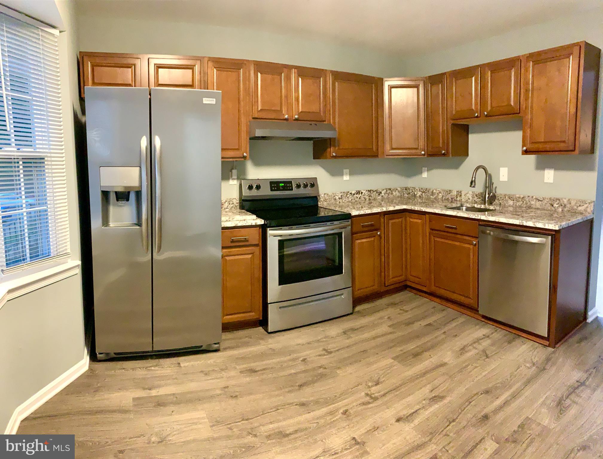 1667 Ridgely Court, Unit 178 Crofton, MD 21114 - Photo 4 of 33 Spacious Kitchen w/Stainless Steel and Granite