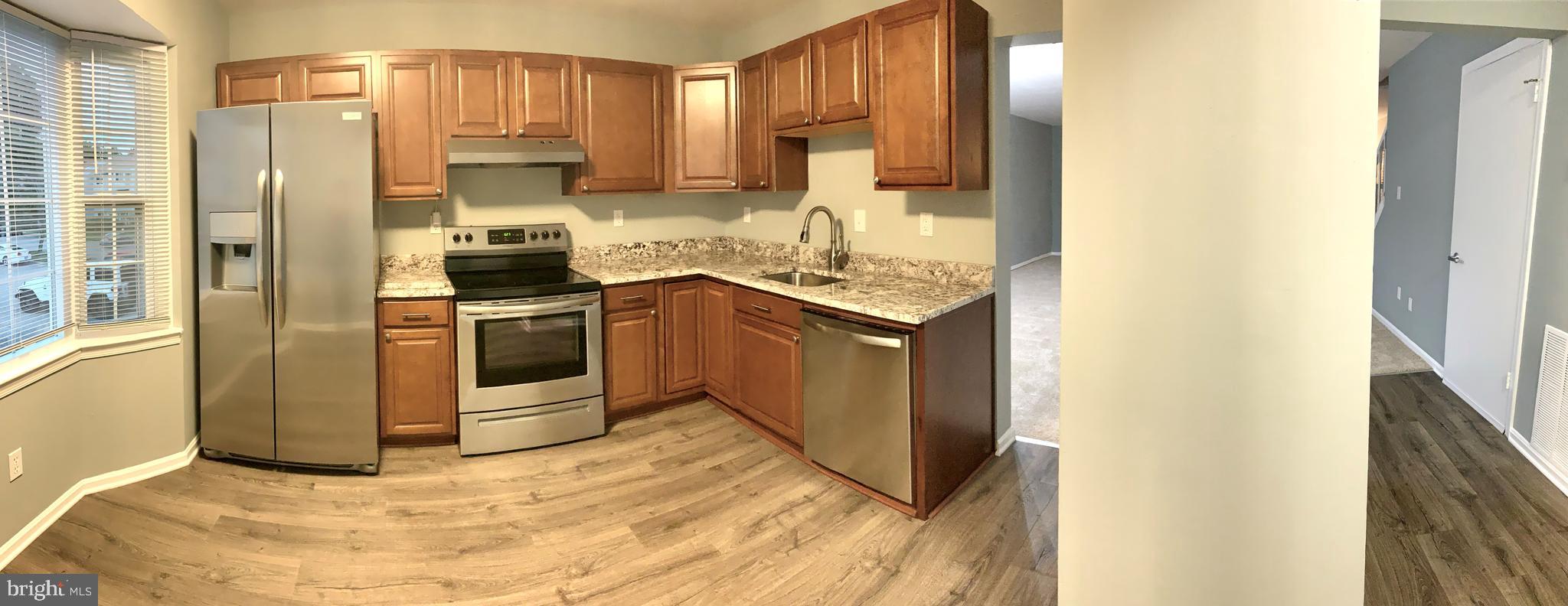 1667 Ridgely Court, Unit 178 Crofton, MD 21114 - Photo 7 of 33 Kitchen - Opens to Foyer and Dining Area