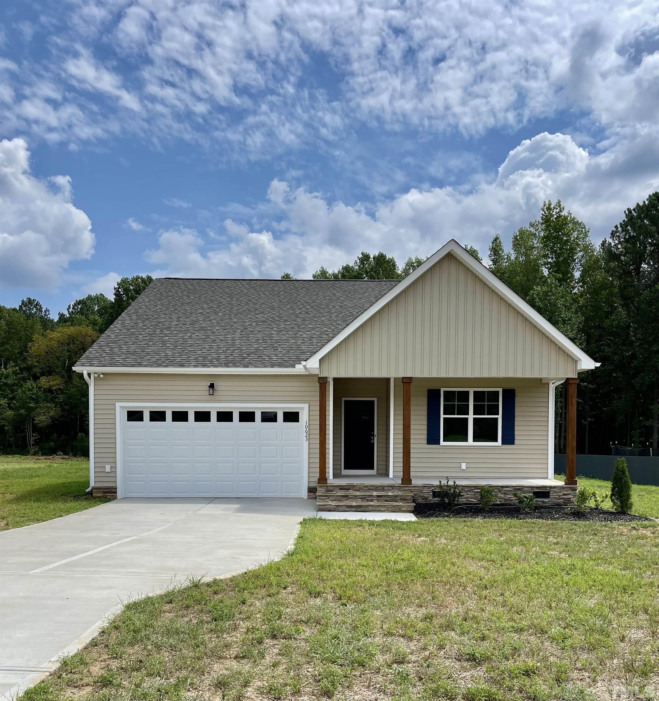10623 West Old Spring Hope Road Spring Hope, NC 27882 - Photo 1 of 33 front view of a house with a yard