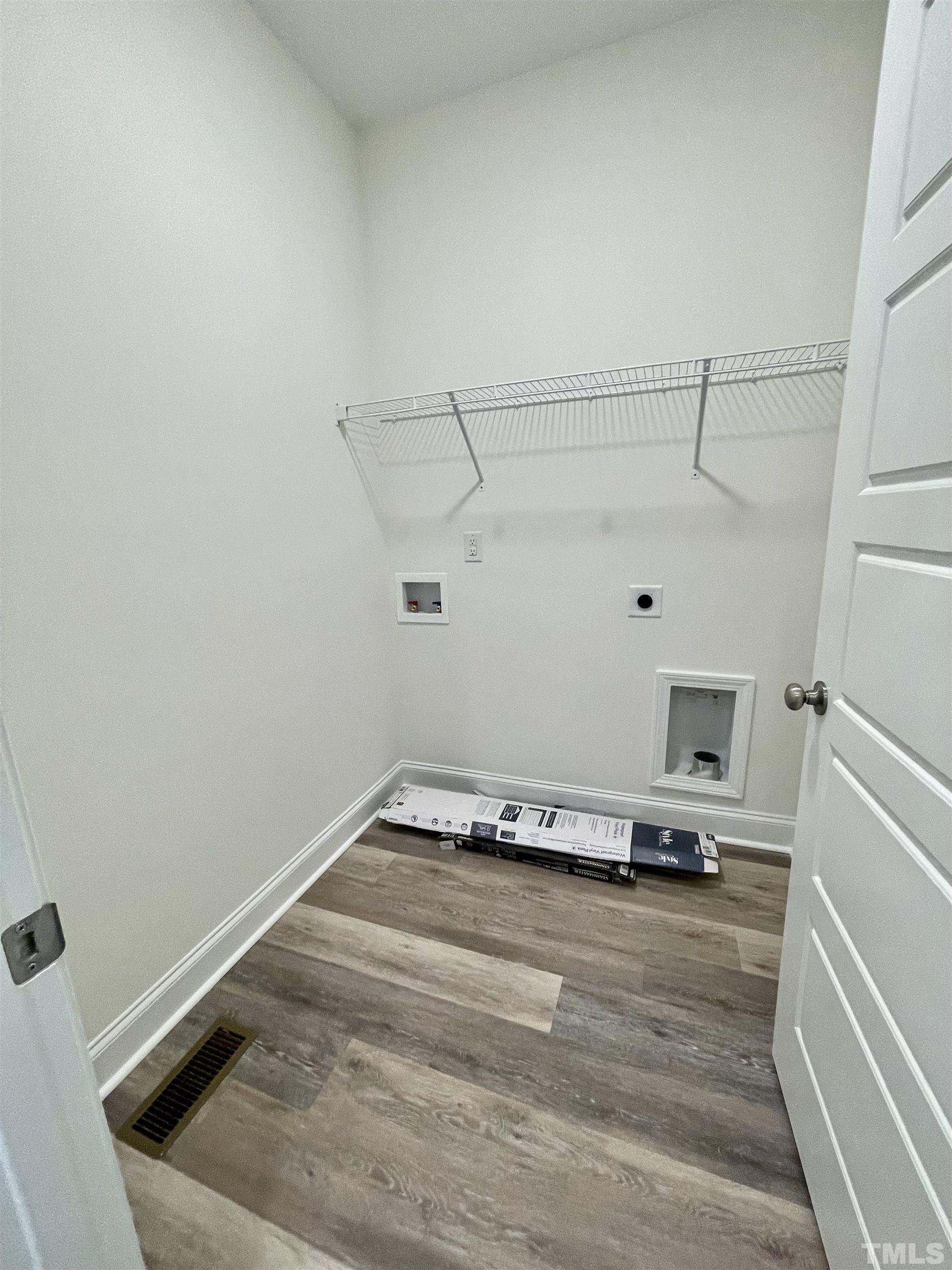 10623 West Old Spring Hope Road Spring Hope, NC 27882 - Photo 17 of 33 a view of a room with racks on the wall