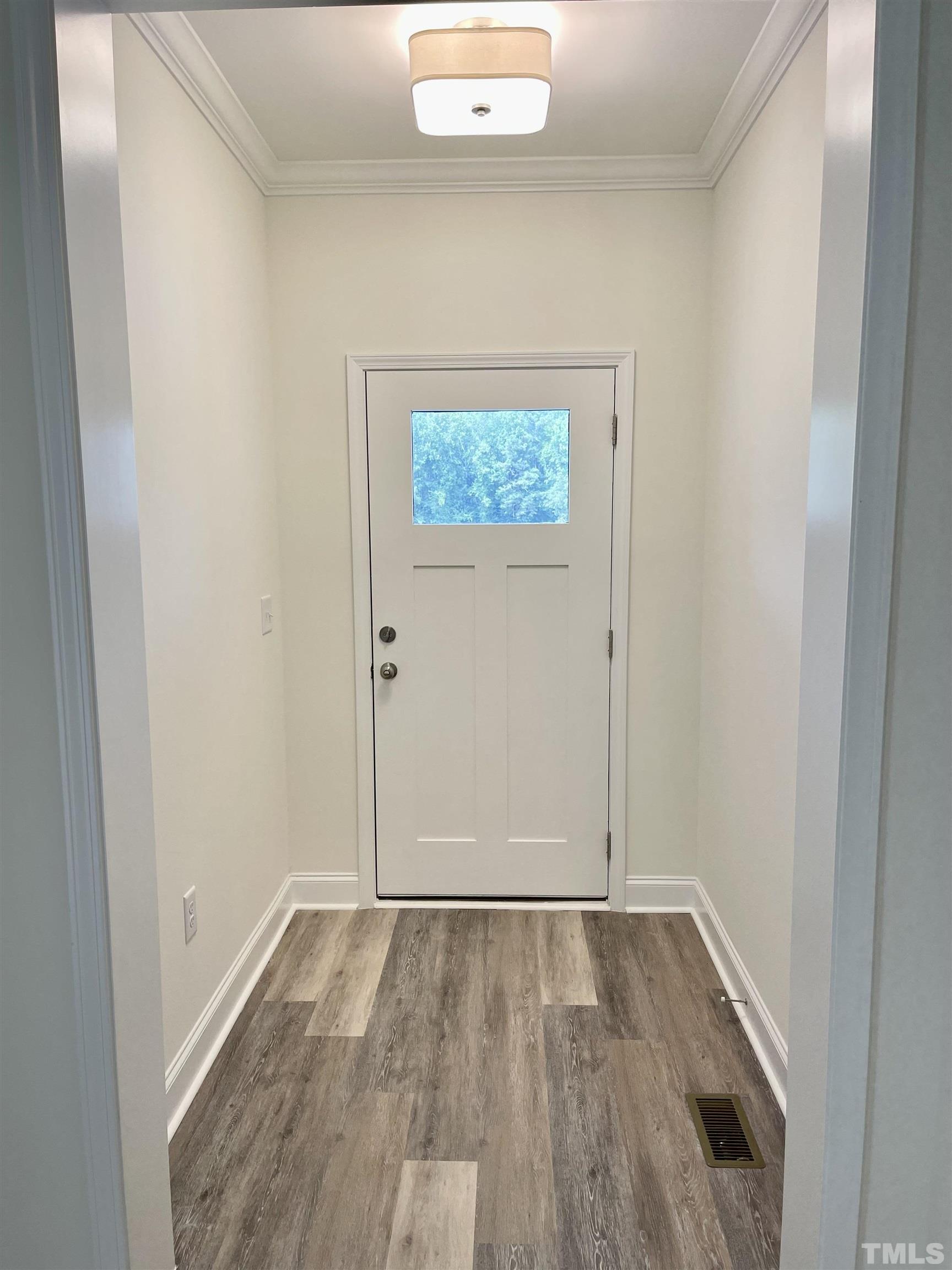 10623 West Old Spring Hope Road Spring Hope, NC 27882 - Photo 2 of 33 wooden floor in a empty room