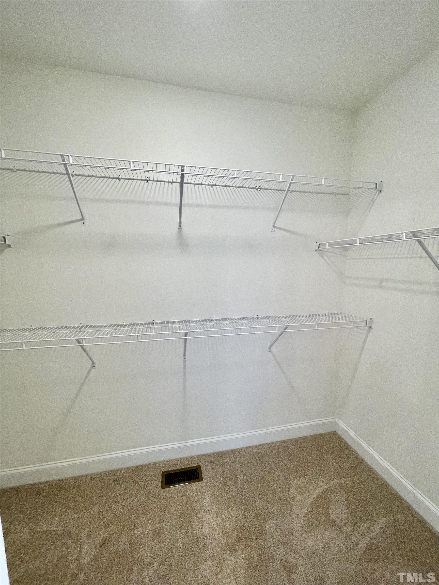 10623 West Old Spring Hope Road Spring Hope, NC 27882 - Photo 25 of 33 a view of a room with racks on the wall