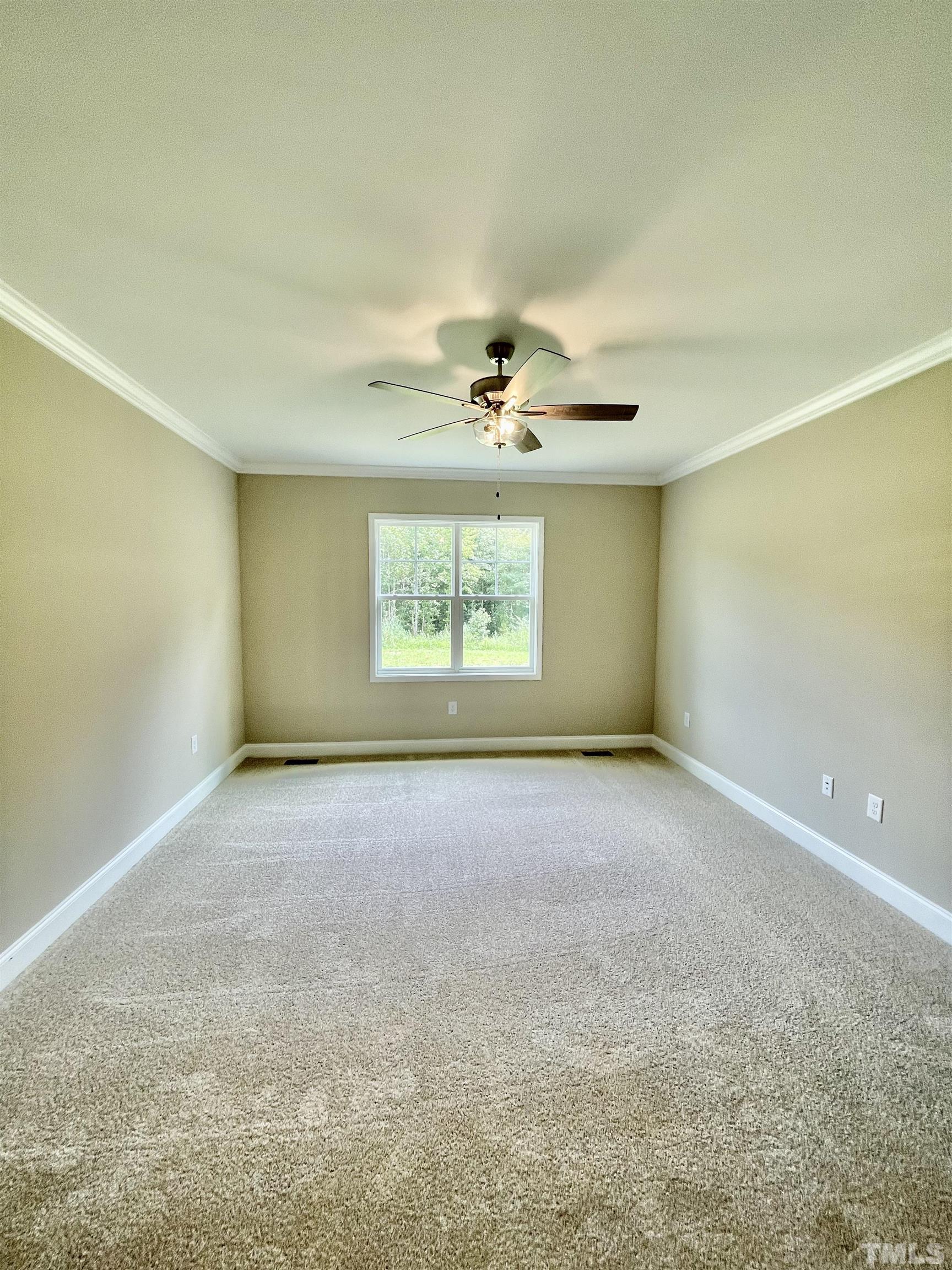 10623 West Old Spring Hope Road Spring Hope, NC 27882 - Photo 28 of 33 an empty room with a window