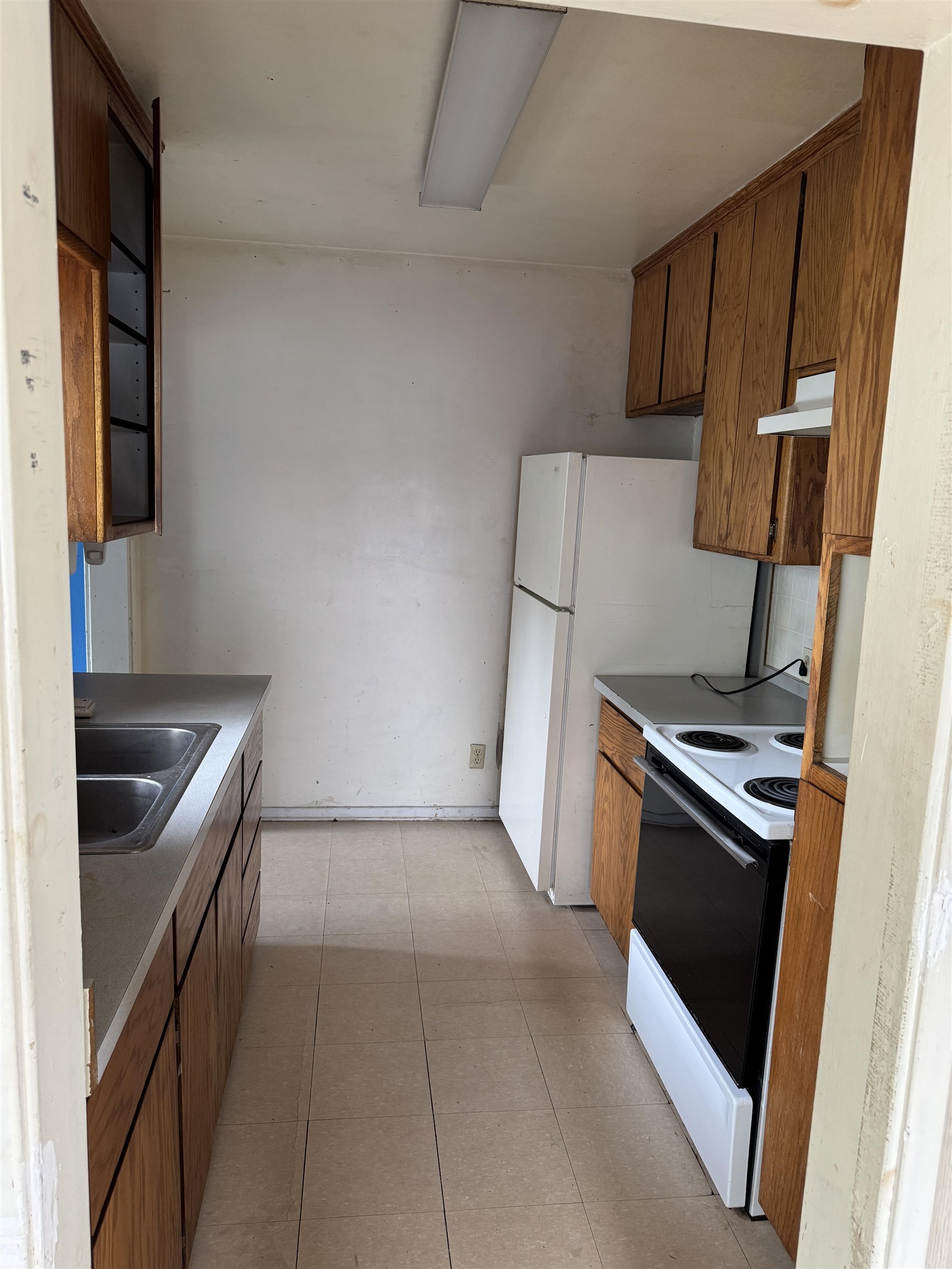 225 Lassen Street Chester, CA 96020 - Photo 5 of 23 a kitchen with a stove and a microwave