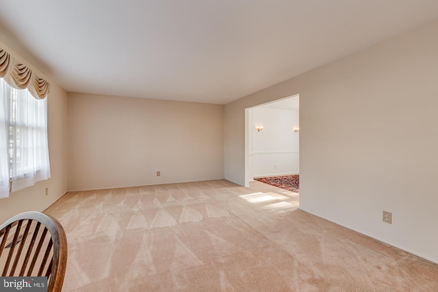 18 Locust Grove Road Cherry Hill, NJ 08003 - Photo 7 of 38 Large living room, hardwood floors under carpet