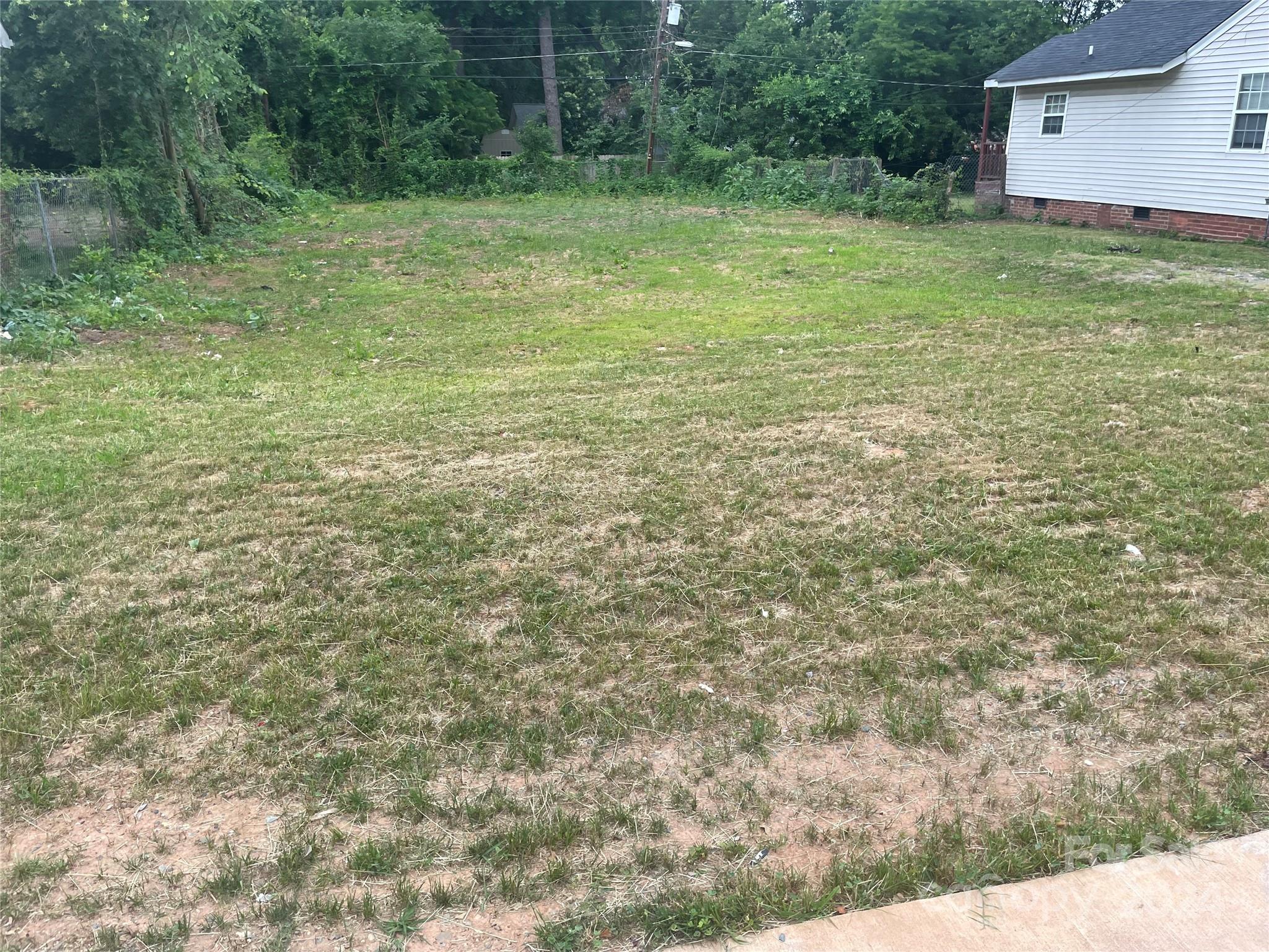 1615 Beatties Ford Road Charlotte, NC 28216 - Photo 4 of 5 a view of outdoor space and yard