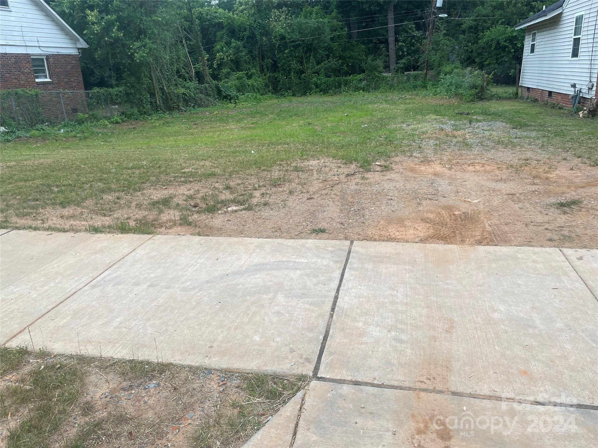 1615 Beatties Ford Road Charlotte, NC 28216 - Photo 5 of 5 a view of a backyard