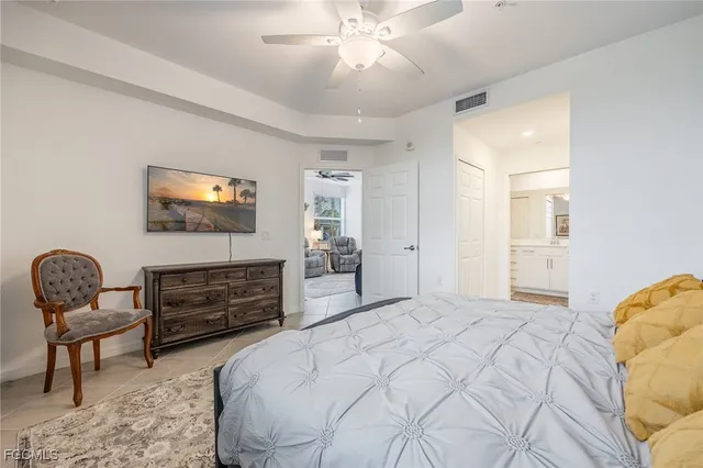 a bedroom with a bed and furniture