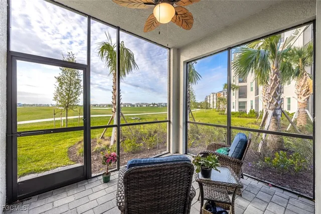 a living room with large windows
