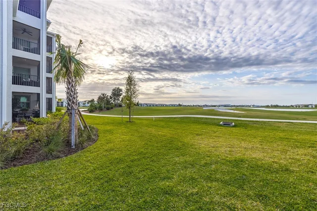 a view of a golf course with a lake